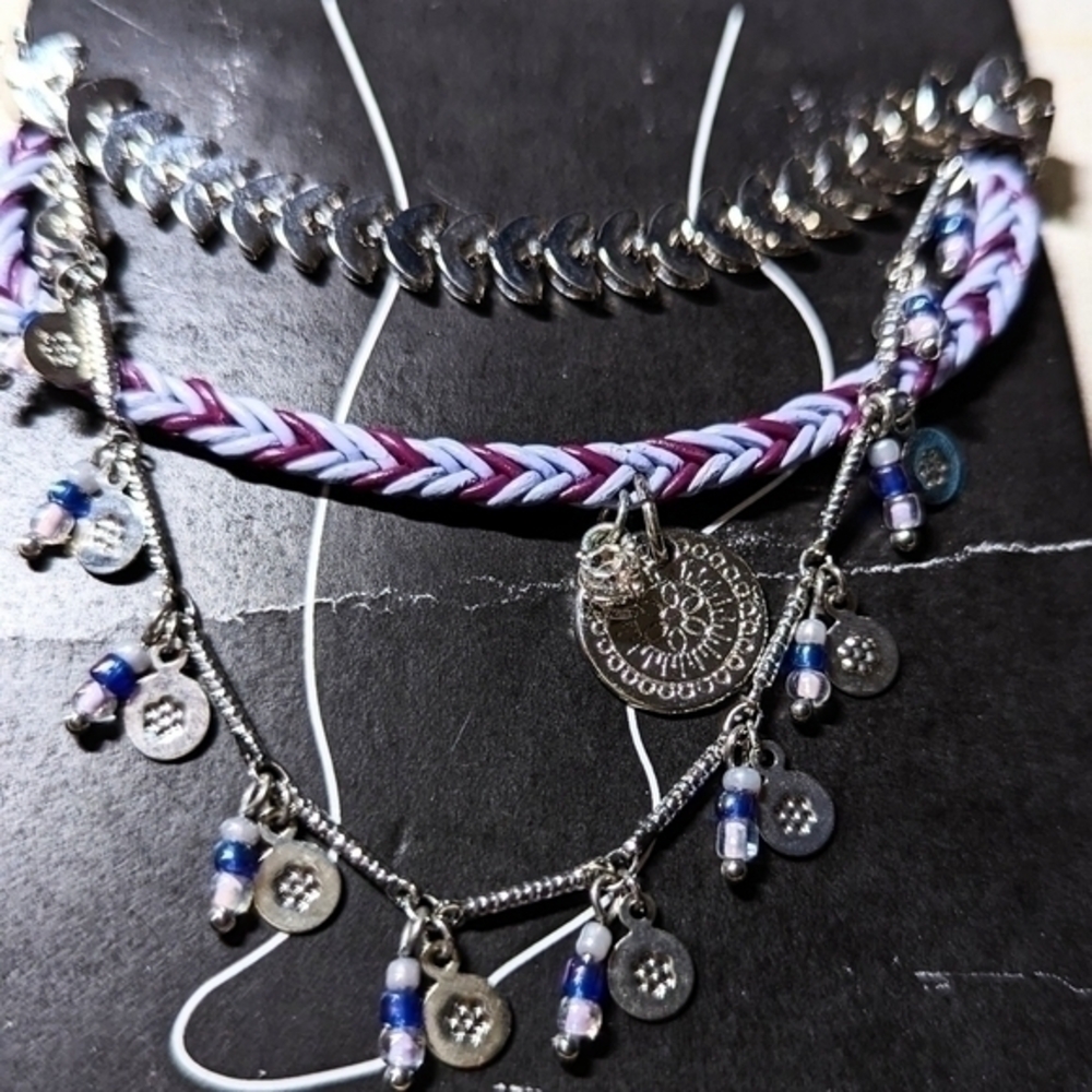 A Tanya creations set of three ankle bracelets. NWT.